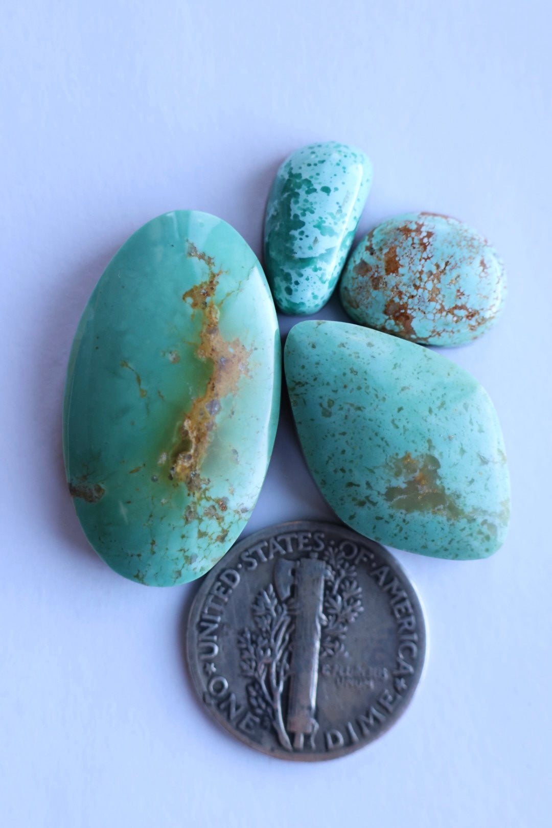 Turquoise mountain and pilot mountain cabochon set