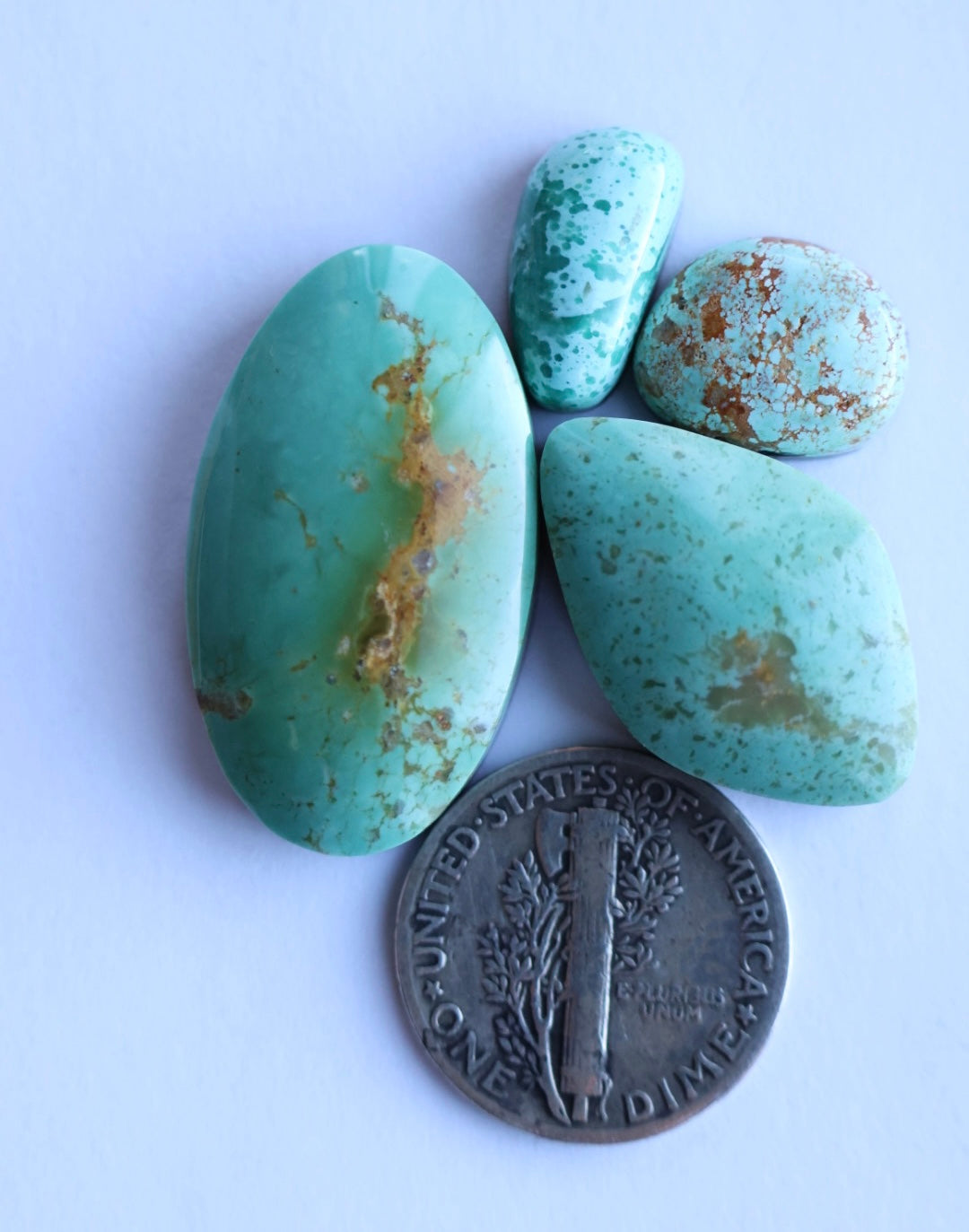 Turquoise mountain and pilot mountain cabochon set